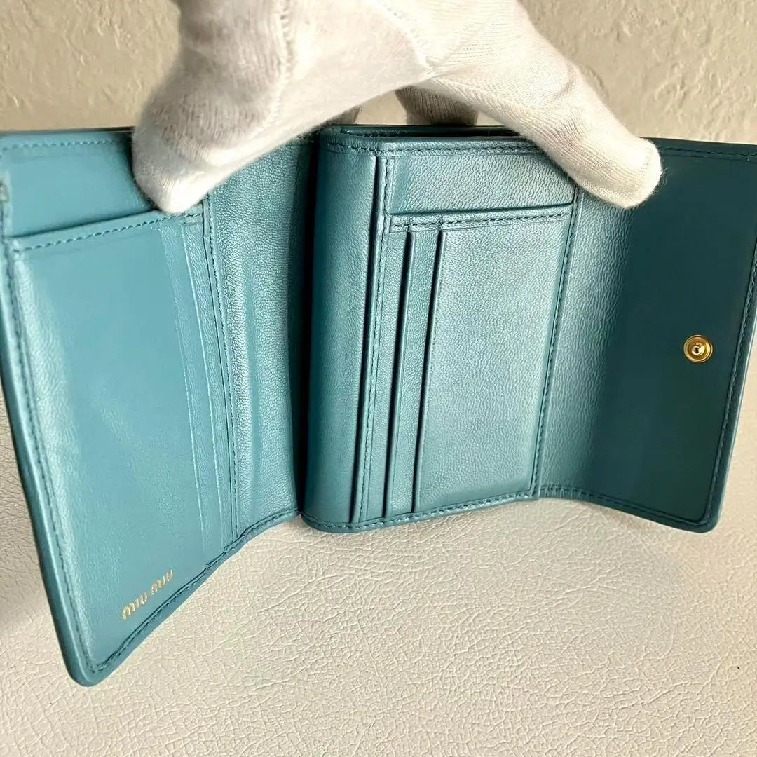 Current model RFID MIUMIU Tri-fold Wallet Matterasse Leather Blue