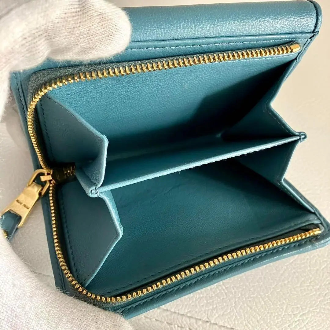 Current model RFID MIUMIU Tri-fold Wallet Matterasse Leather Blue