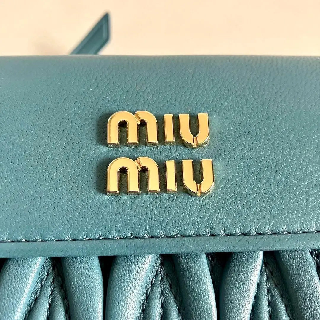 Current model RFID MIUMIU Tri-fold Wallet Matterasse Leather Blue