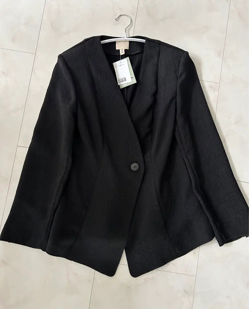 [Con una bonita etiqueta] Chaqueta texturizada H&amp;M Chaqueta negra entallada