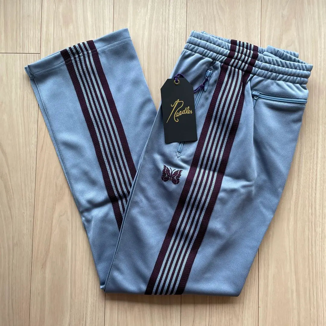 Brand new, unused needles track pants, sax blue