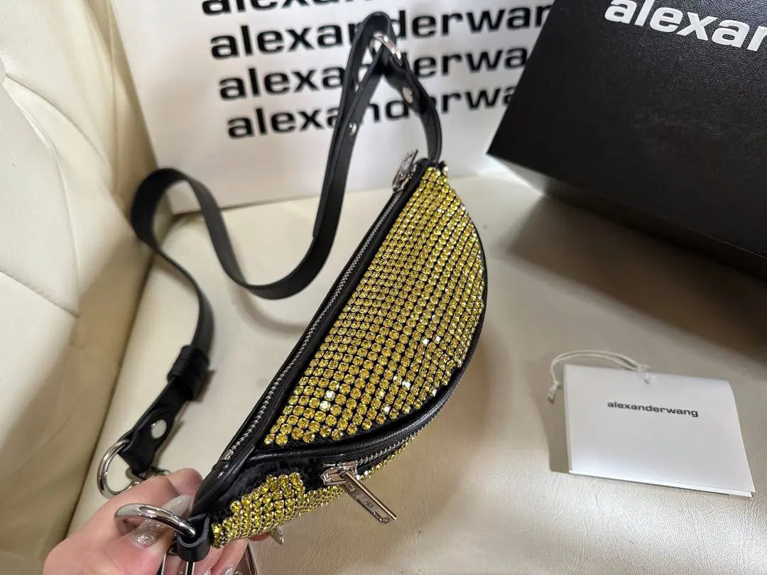 Bolso mini con diamantes de imitación y diseño tipo riñonera de Alexander Wang en color amarillo