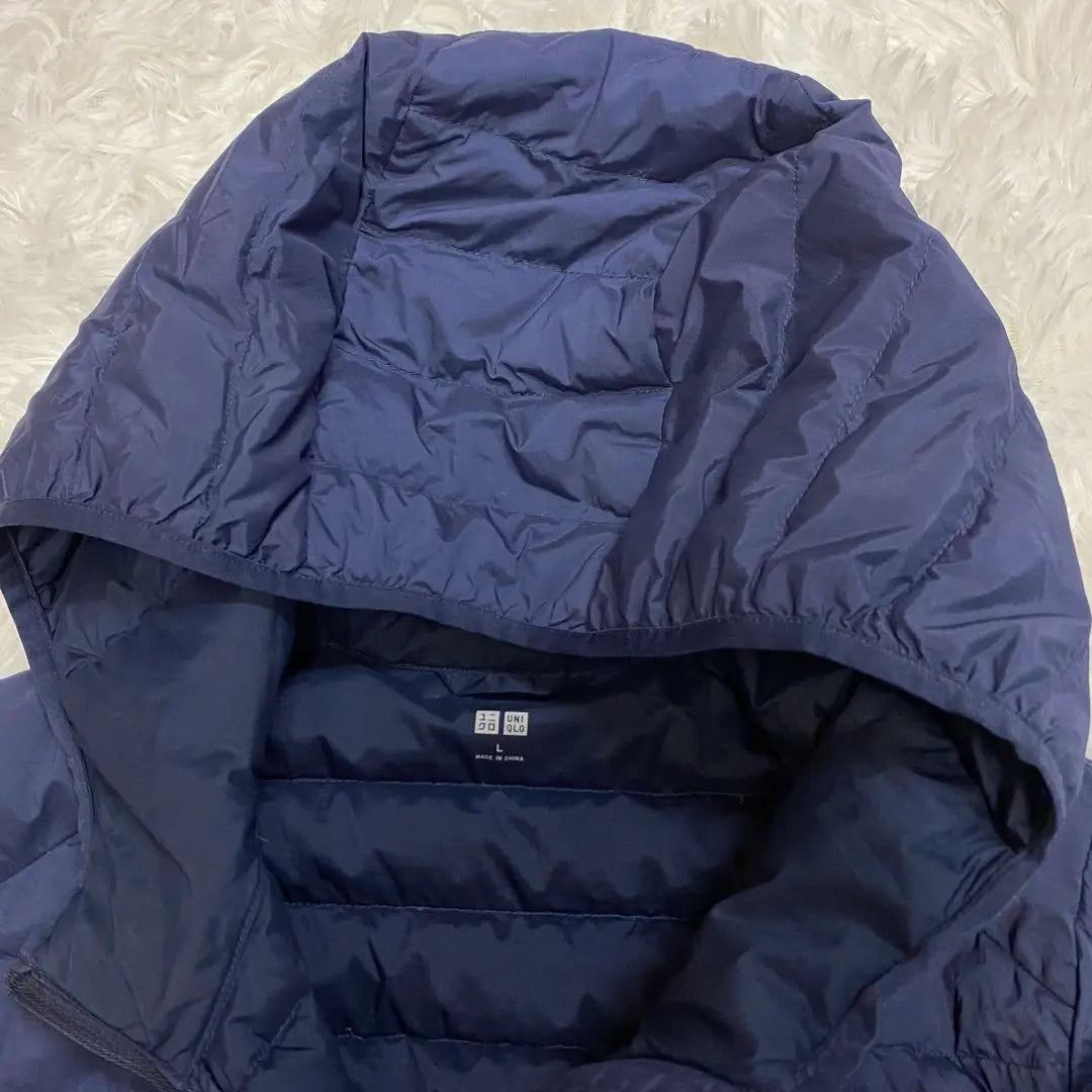 Chaqueta con capucha de plumón ultraligero UNIQLO L Azul marino