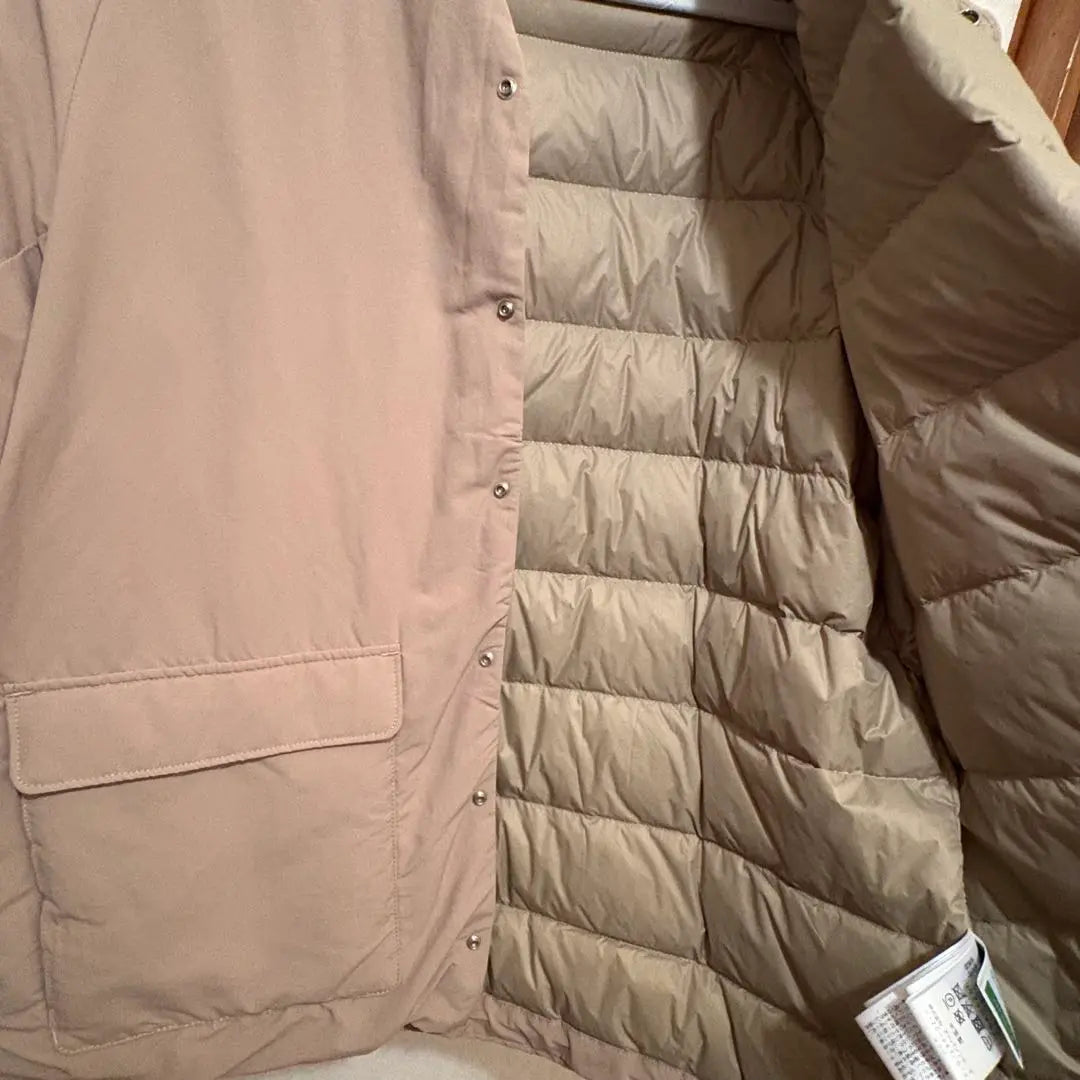 Beige down jacket