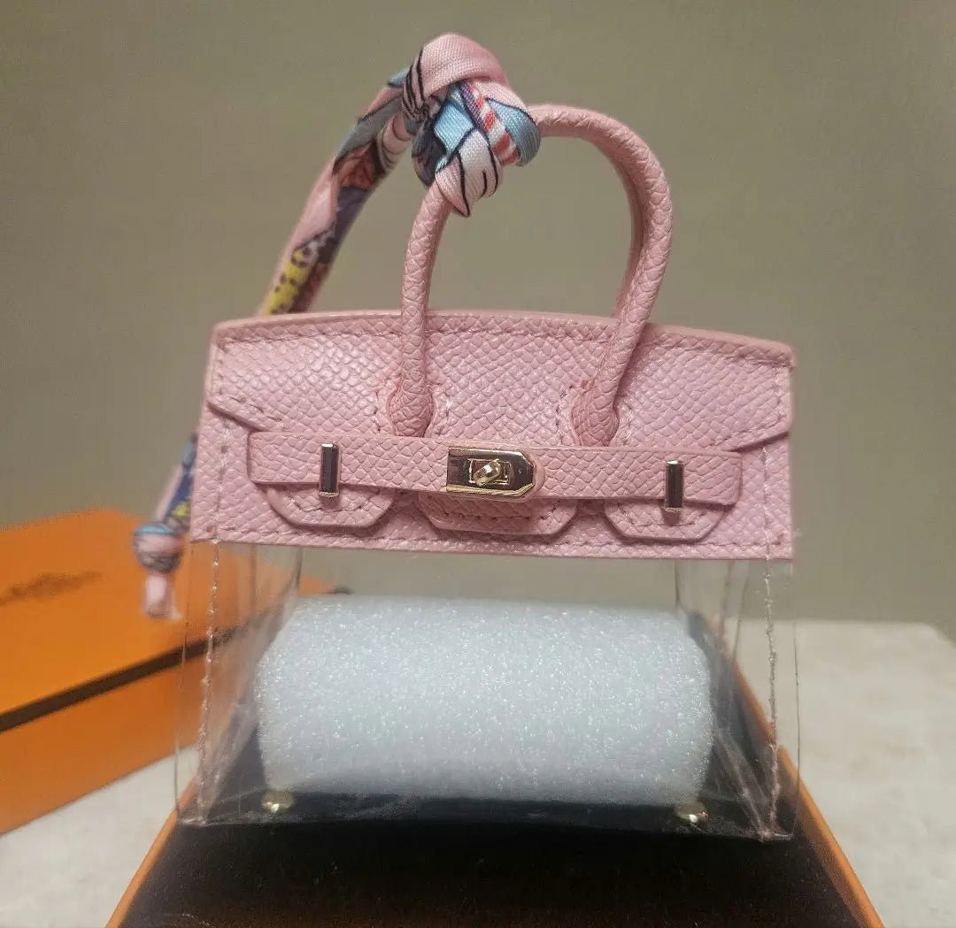 Mini bolso tipo llavero con dije de bolso