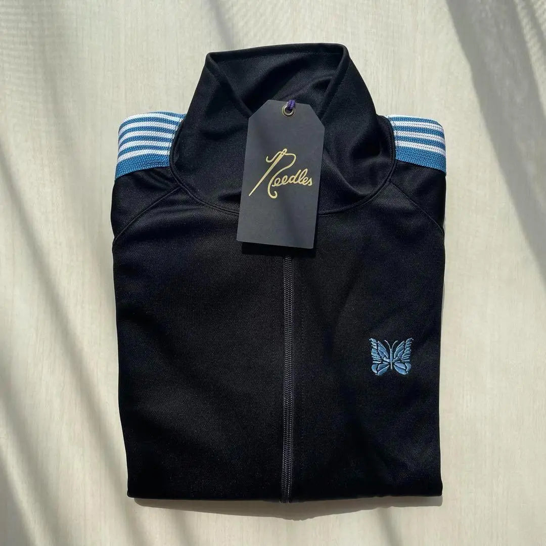 Chaqueta deportiva L Negro Azul Blanco Agujas 11