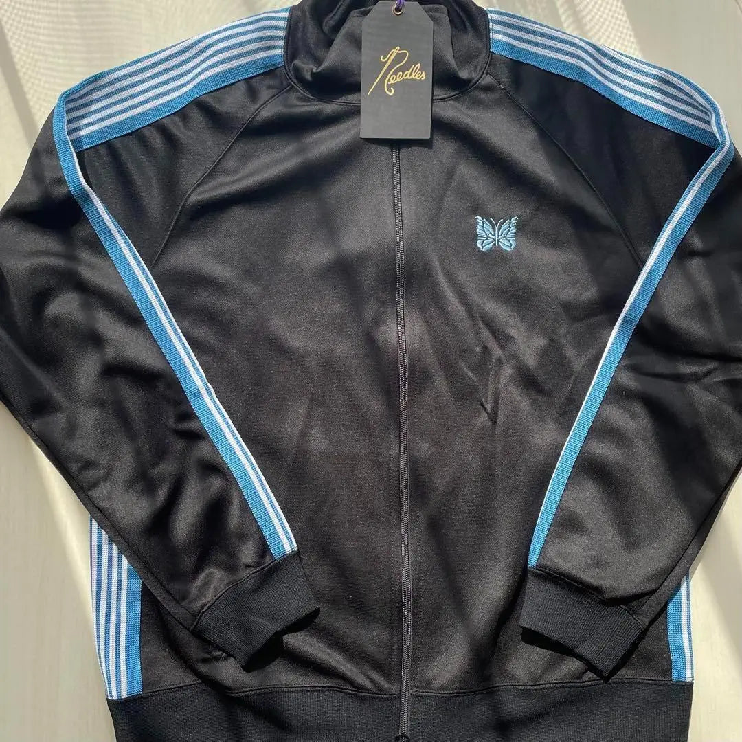 Chaqueta deportiva L Negro Azul Blanco Agujas 11