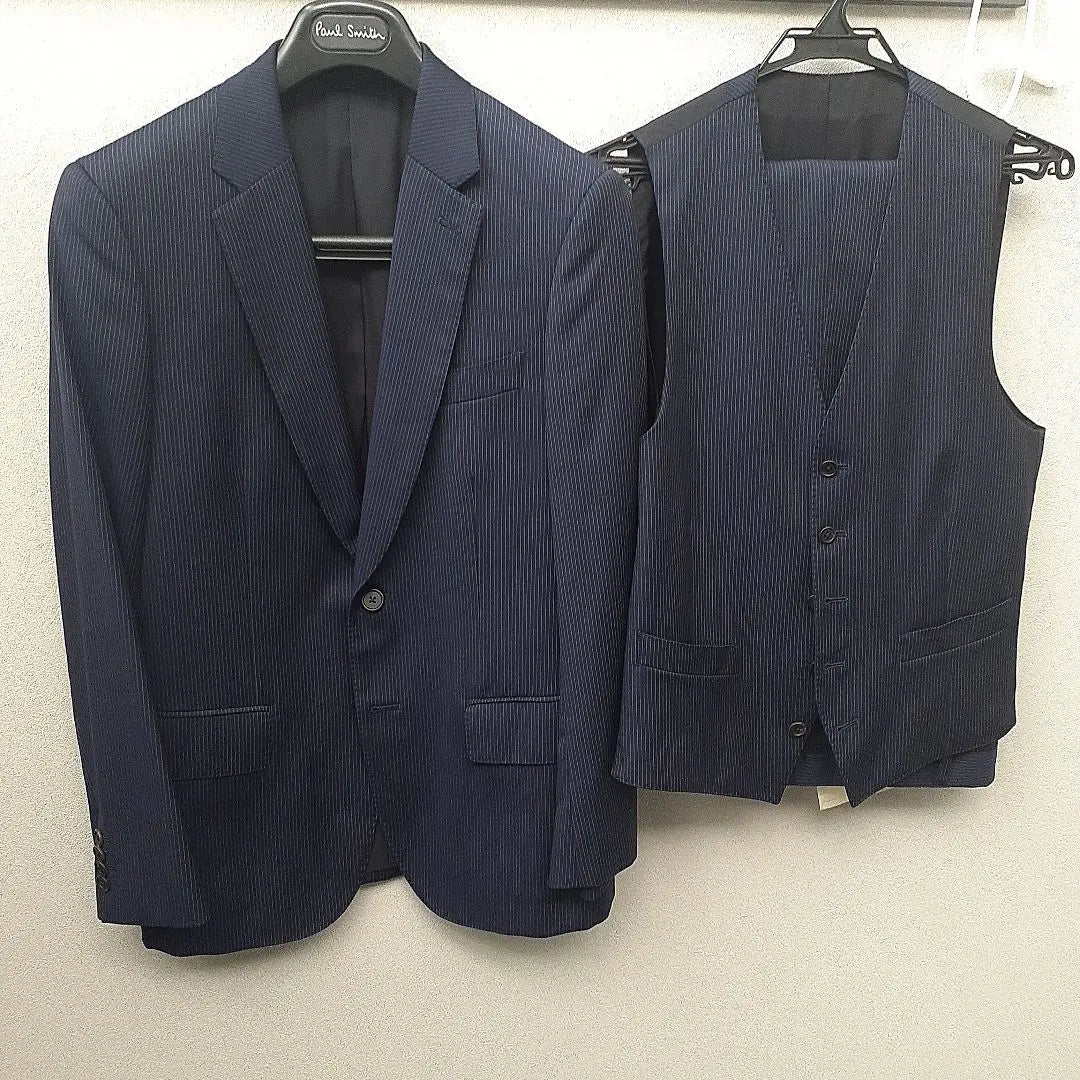 Cleaned, in good condition, Paul Smith three-piece suit, navy vest, dark blue