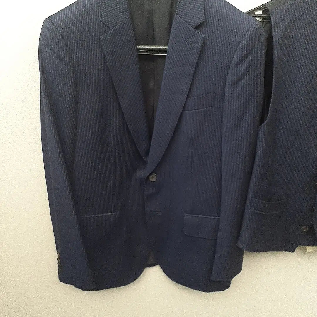 Cleaned, in good condition, Paul Smith three-piece suit, navy vest, dark blue