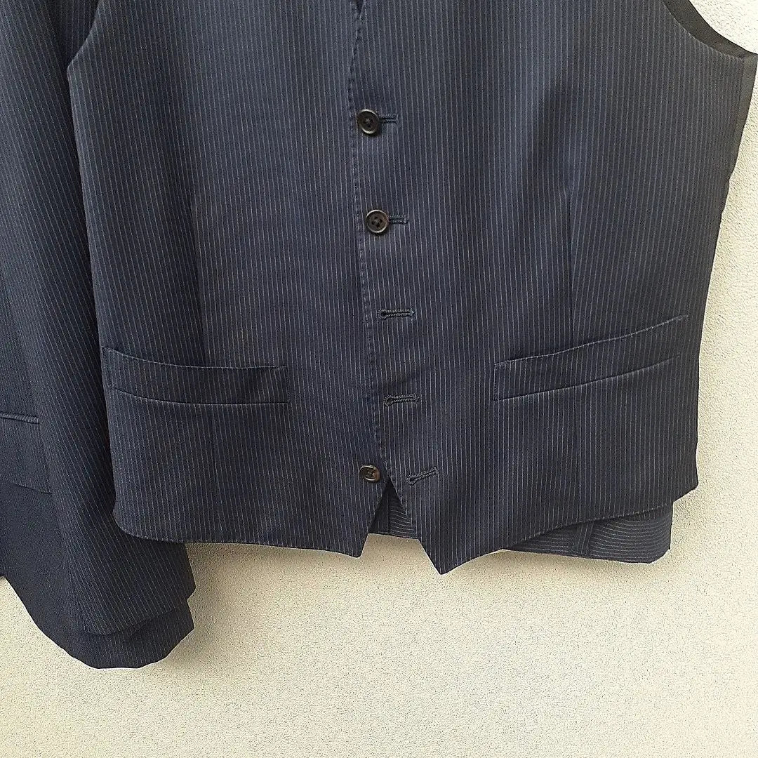 Cleaned, in good condition, Paul Smith three-piece suit, navy vest, dark blue