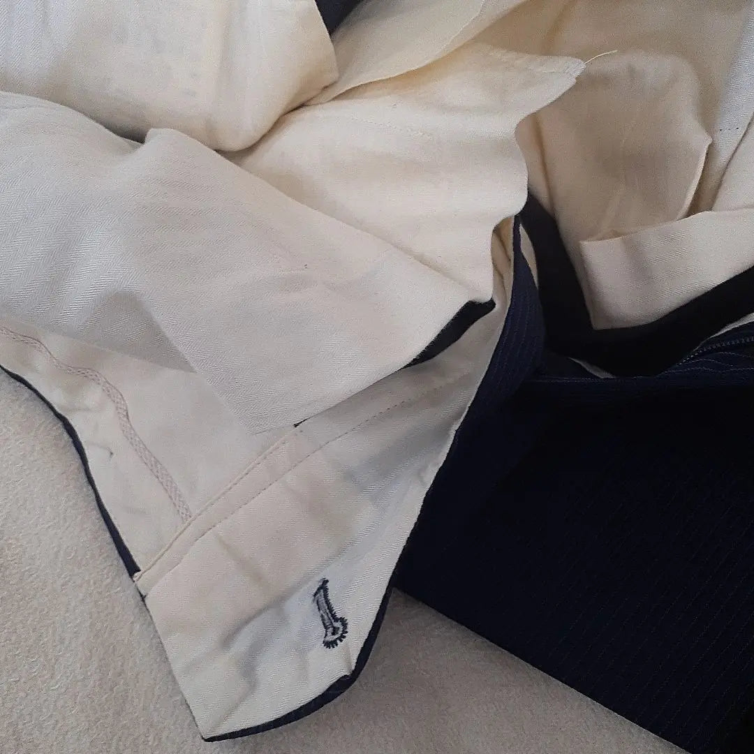 Cleaned, in good condition, Paul Smith three-piece suit, navy vest, dark blue