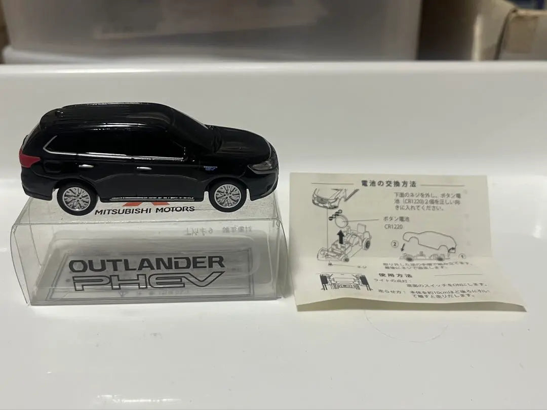 Not for sale, unused Mitsubishi Outlander PHEV Black Minicar with light