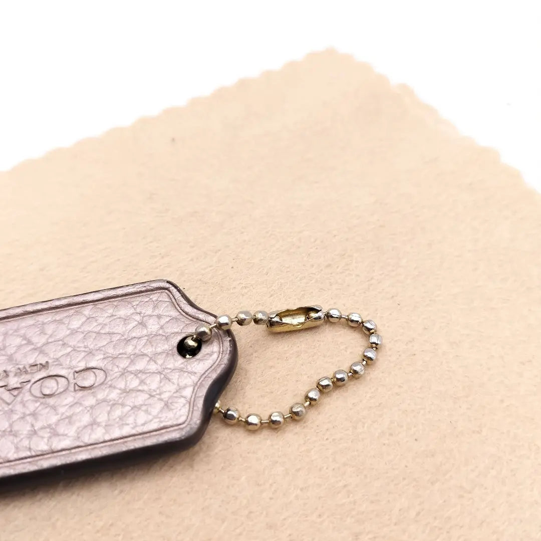 Coach charm bag charm logo plate leather champagne gold | コーチ　チャーム　バッグチャーム　ロゴプレート　レザー　シャンパンゴールド