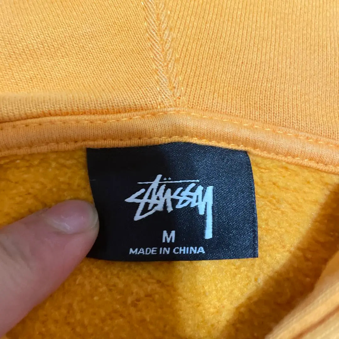 Stussy orange hoodie