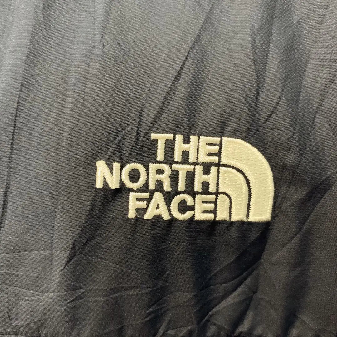 Chaqueta de nailon reversible tipo entrenador de North Face, color azul marino, equivalente a talla L para hombre