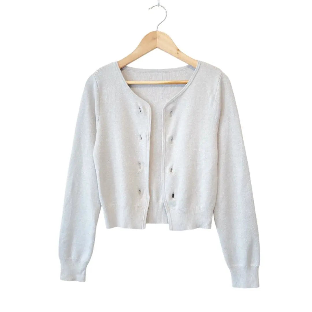 Short cardigan with gold chain button