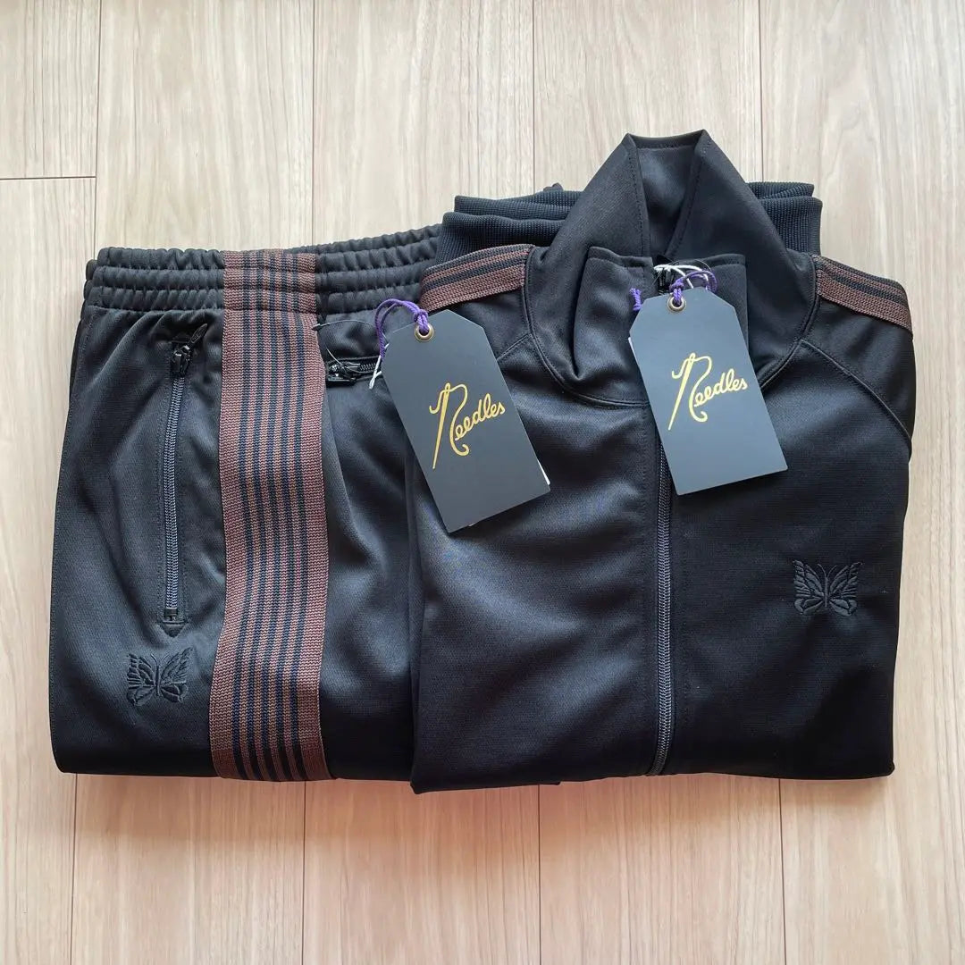 Pantalones deportivos negros y marrones Needles Setup