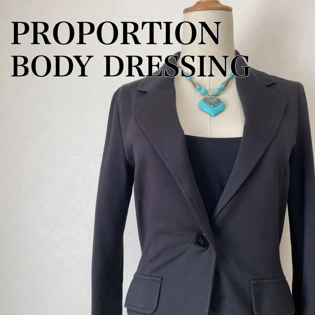 Proportion body dressing, sleeve slit three-quarter sleeve single tailored jacket