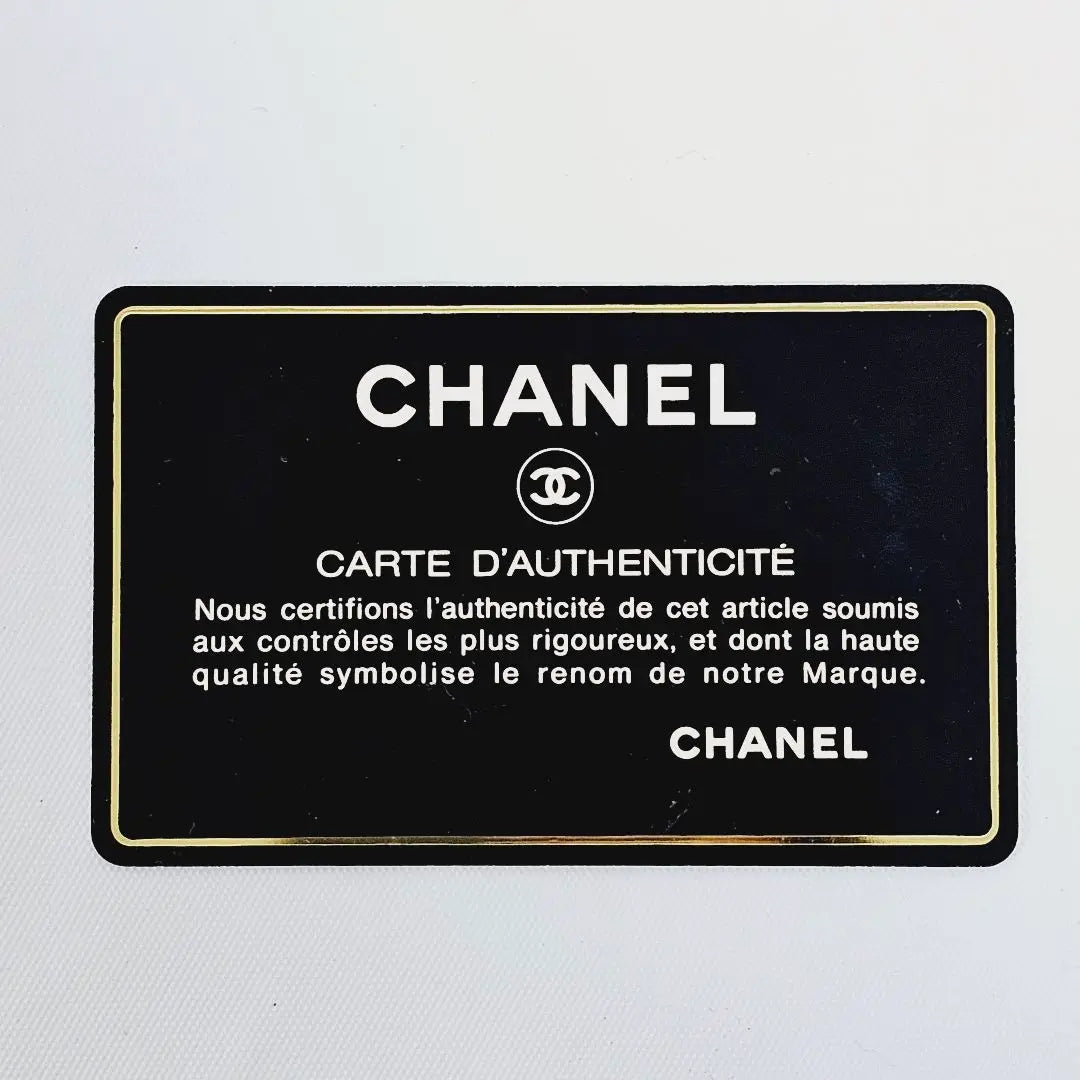 Cinturón de cadena Chanel con marca de trébol