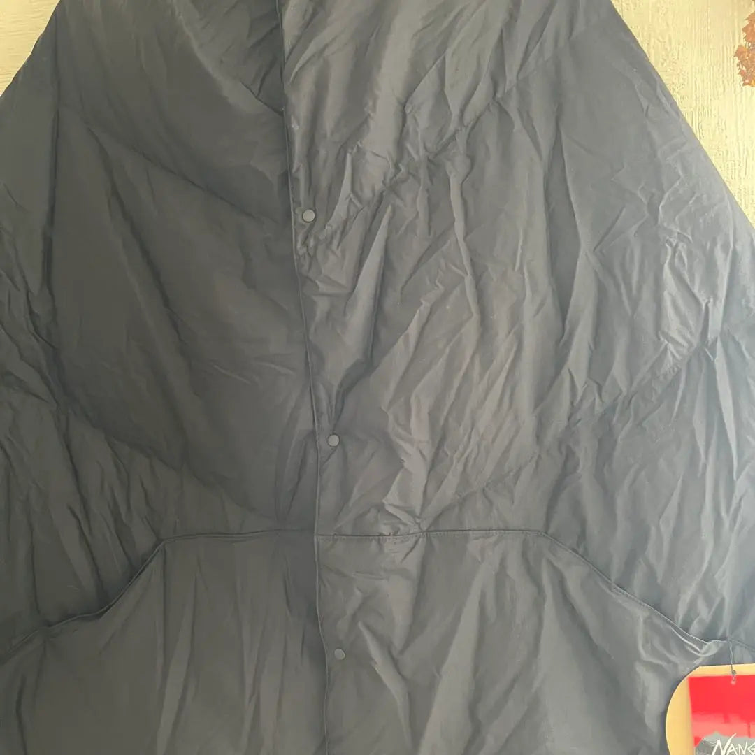 Brand new, unused NANGA down poncho muffler