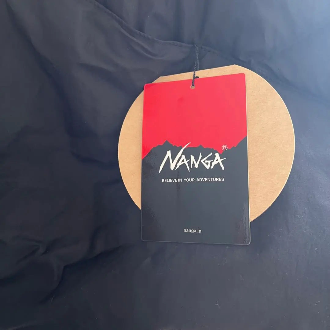 Brand new, unused NANGA down poncho muffler