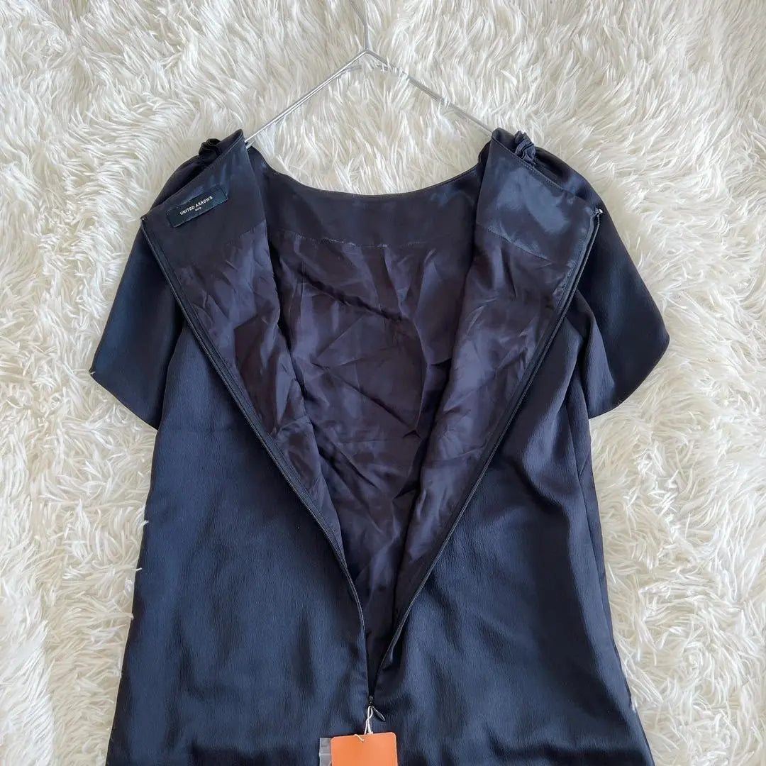 Nuevo vestido de novia con mangas tulipán de United Arrows (38)