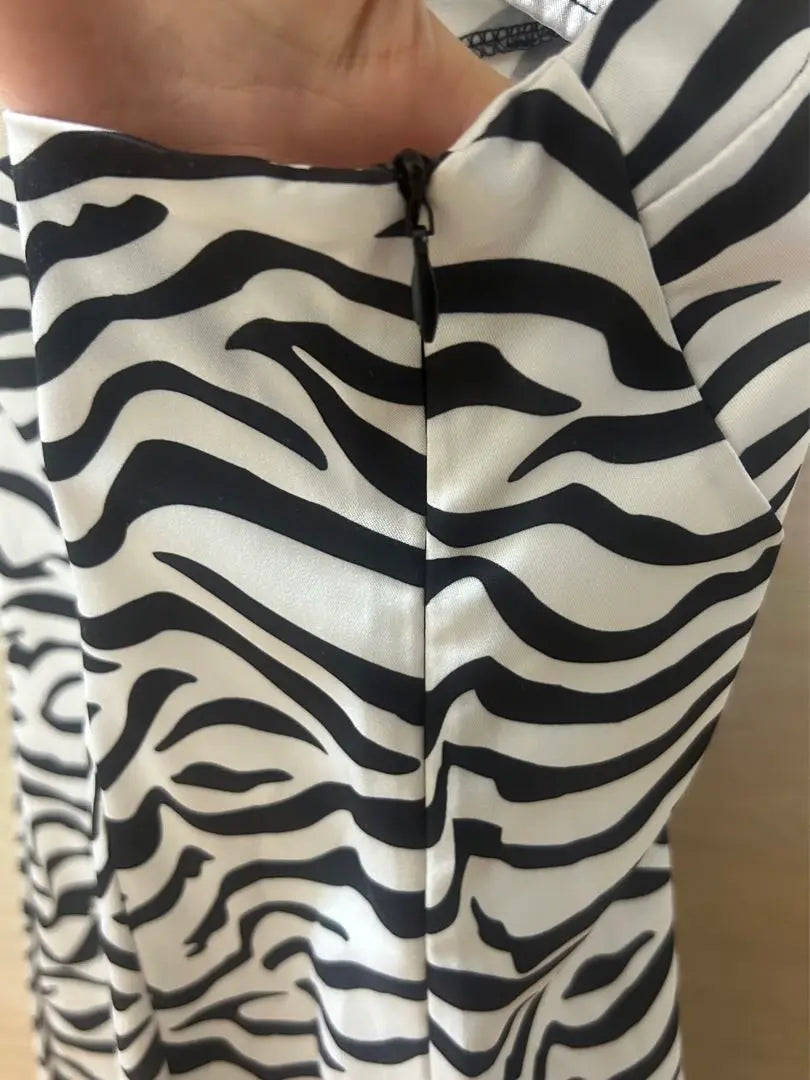 Unused knee-length dress with zebra pattern