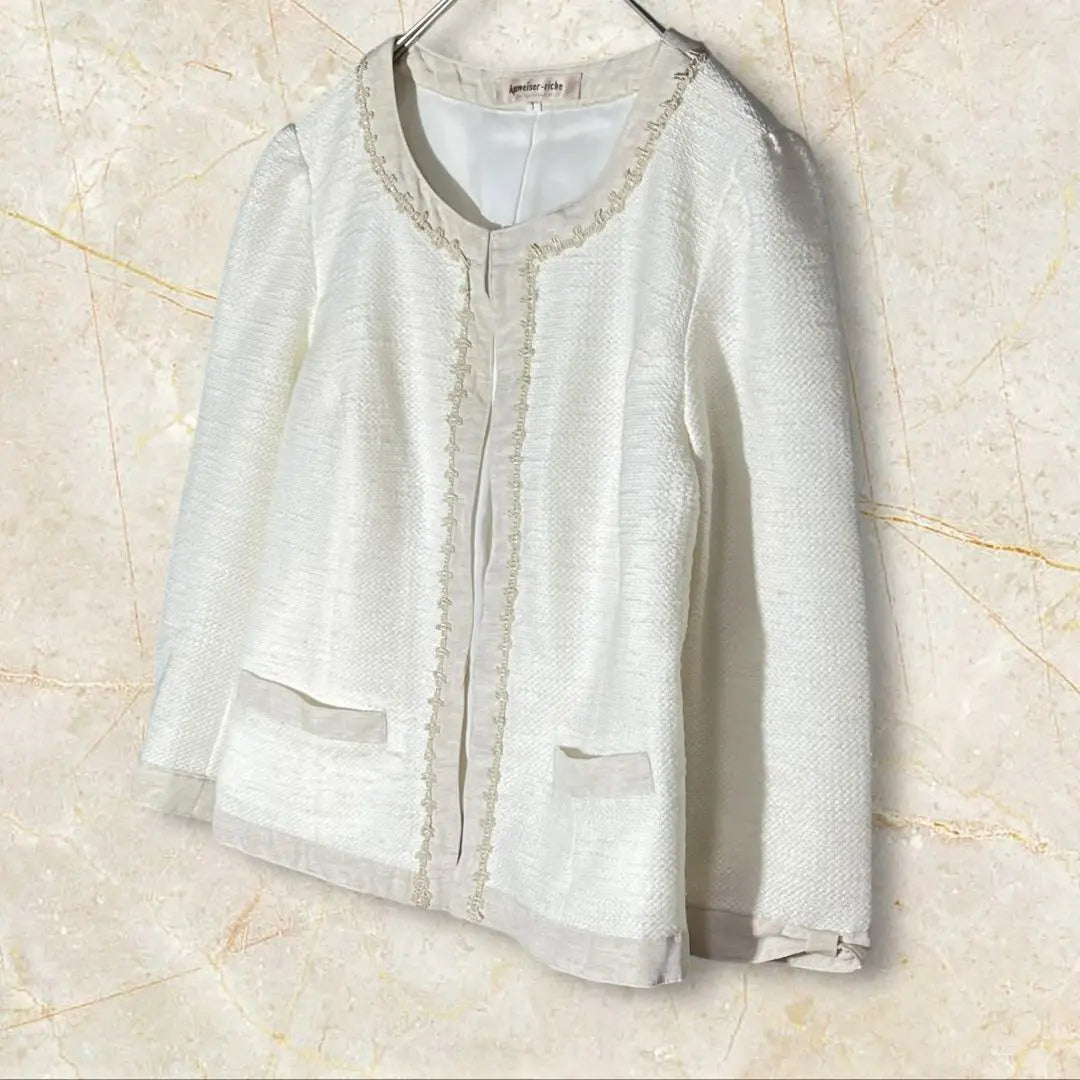 Appuiser Riche Chaqueta sin color Cinta blanca en los puños de la chaqueta | アプワイザーリッシェ ノーカラージャケット ホワイト系 ジャケット 袖口リボン風