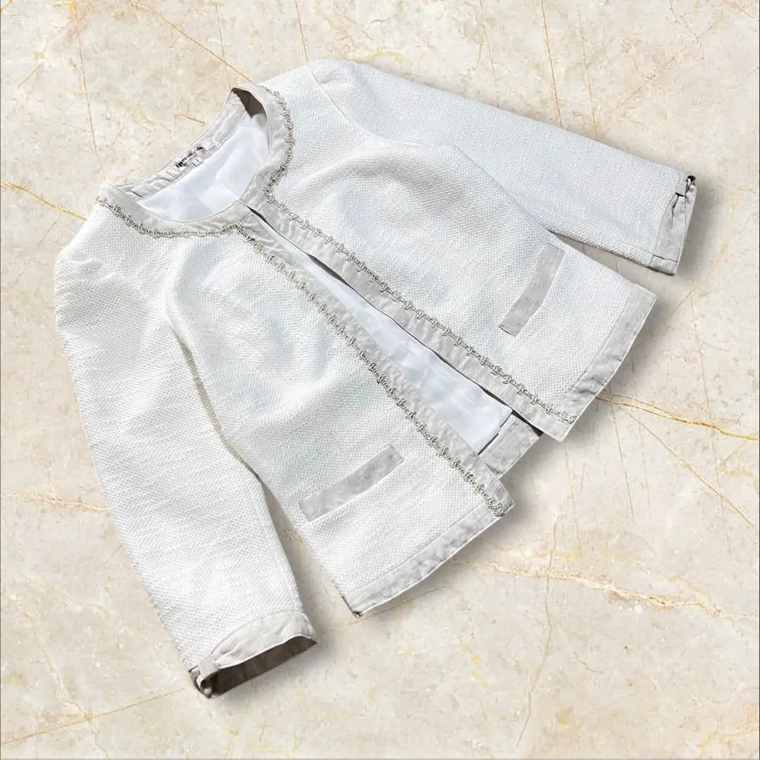 Appuiser Riche Chaqueta sin color Cinta blanca en los puños de la chaqueta | アプワイザーリッシェ ノーカラージャケット ホワイト系 ジャケット 袖口リボン風