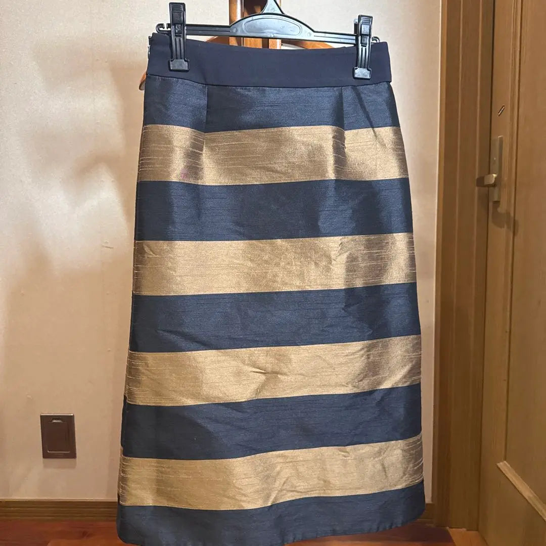 ADORE navy and gold striped long skirt