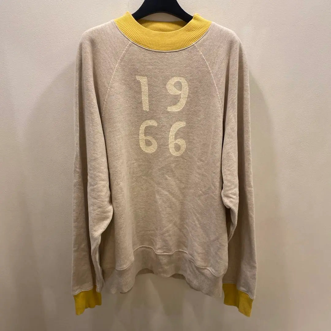 Sudadera con capucha y raglán del capital de 1966