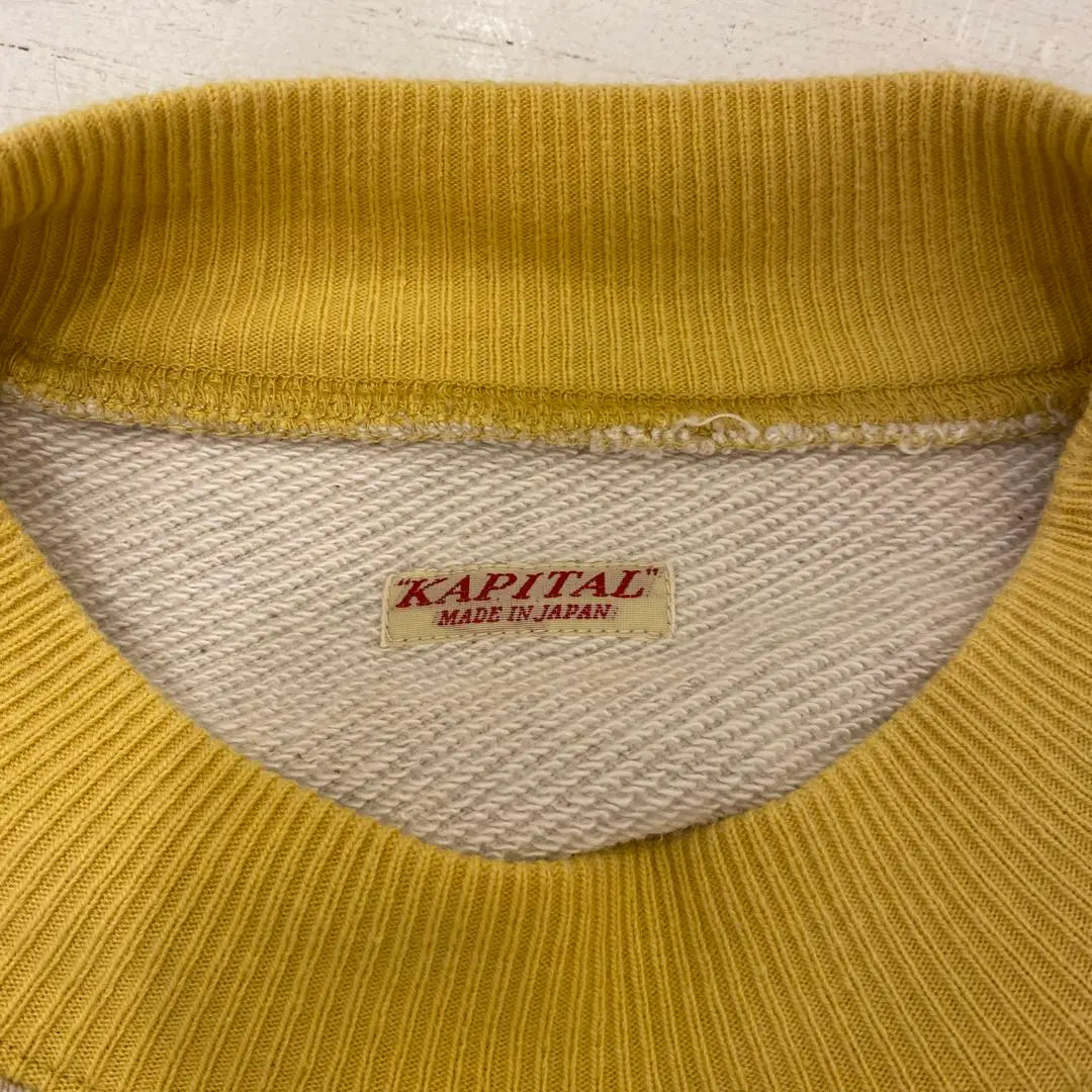 Sudadera con capucha y raglán del capital de 1966