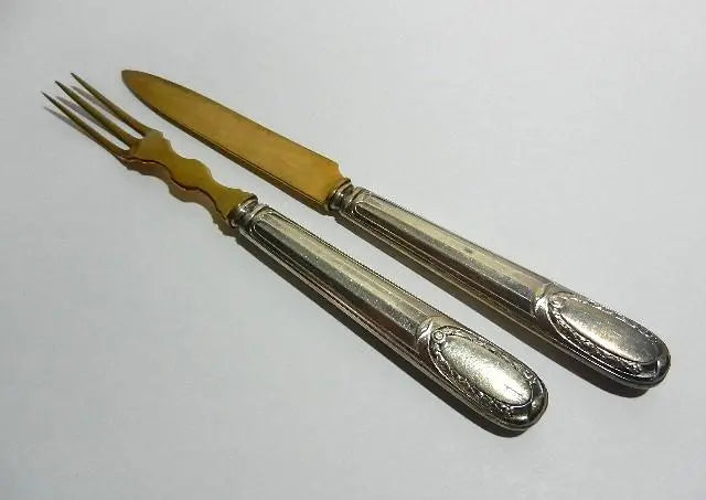 Beautiful brass knives and forks (for desserts and hors d'oeuvres)