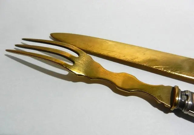 Beautiful brass knives and forks (for desserts and hors d'oeuvres)