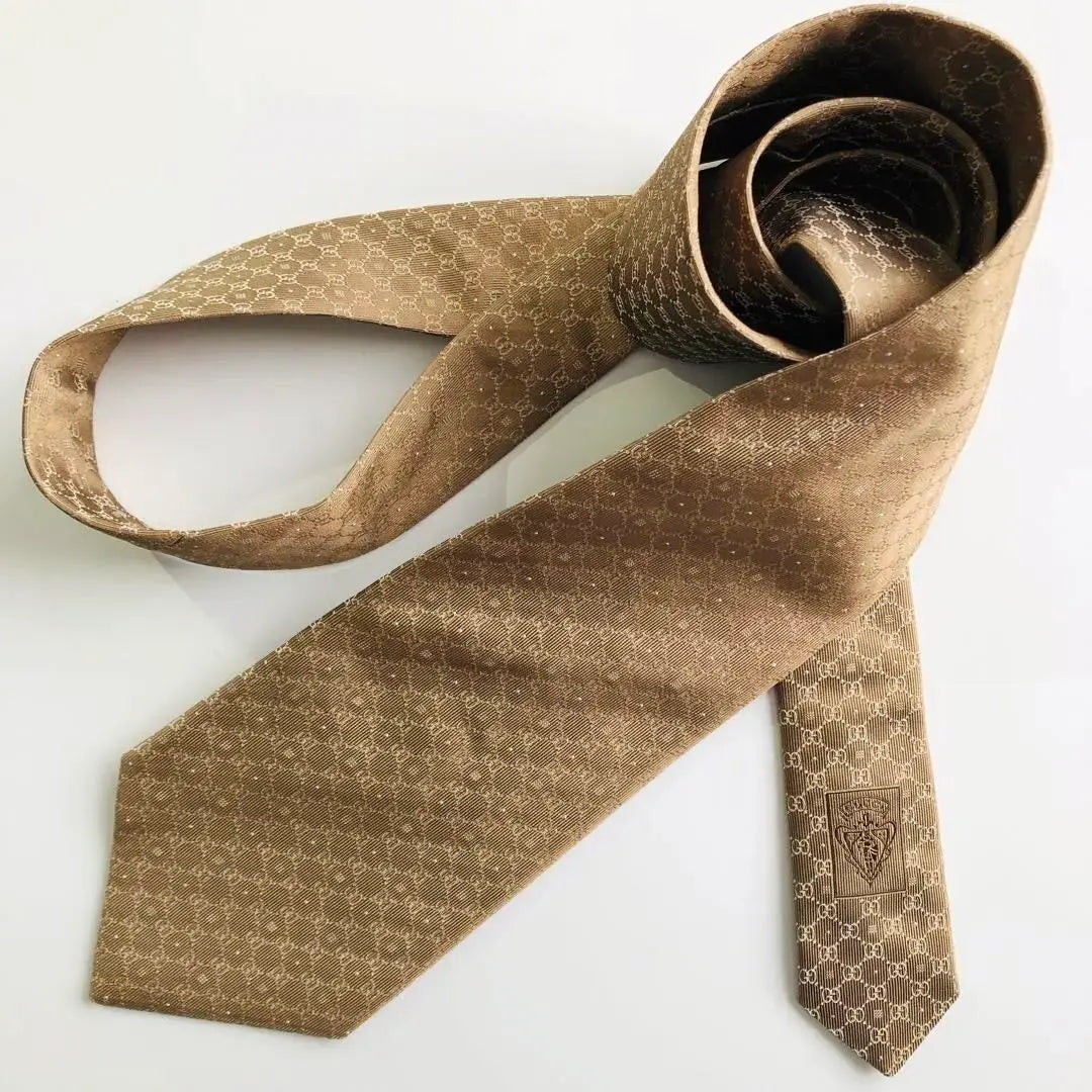 GUCCI tie crest pattern brown