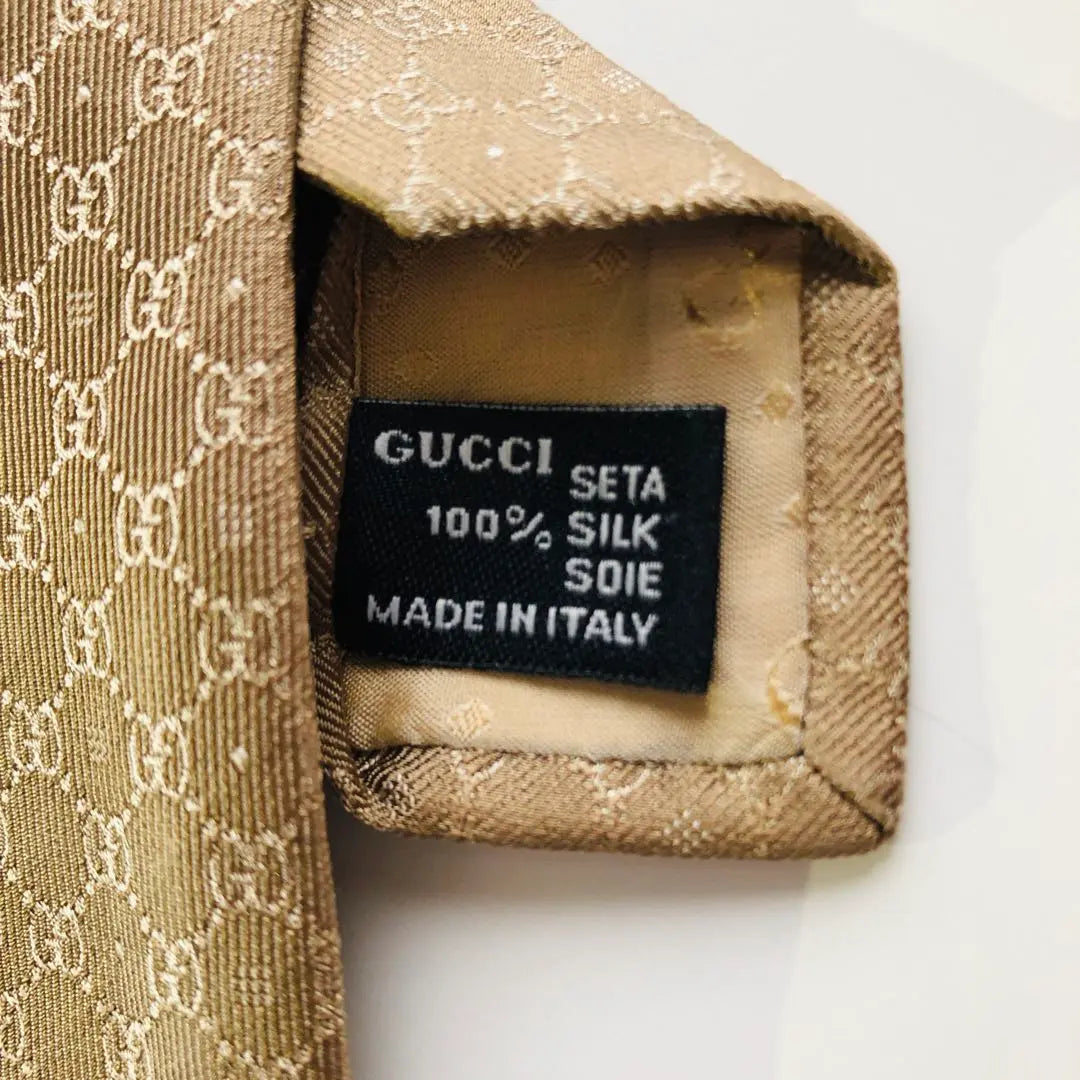 GUCCI tie crest pattern brown