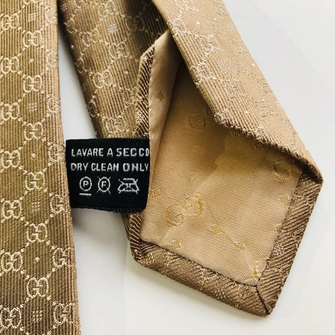 GUCCI tie crest pattern brown