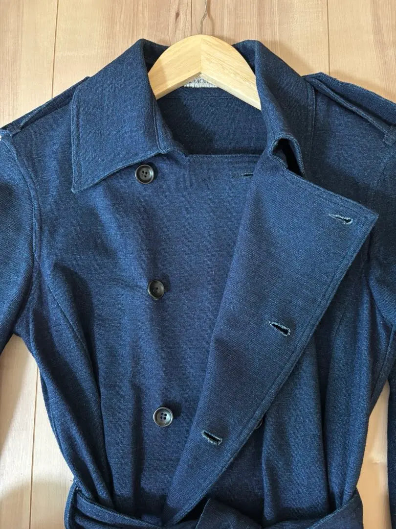 Navy trench coat with waist belt