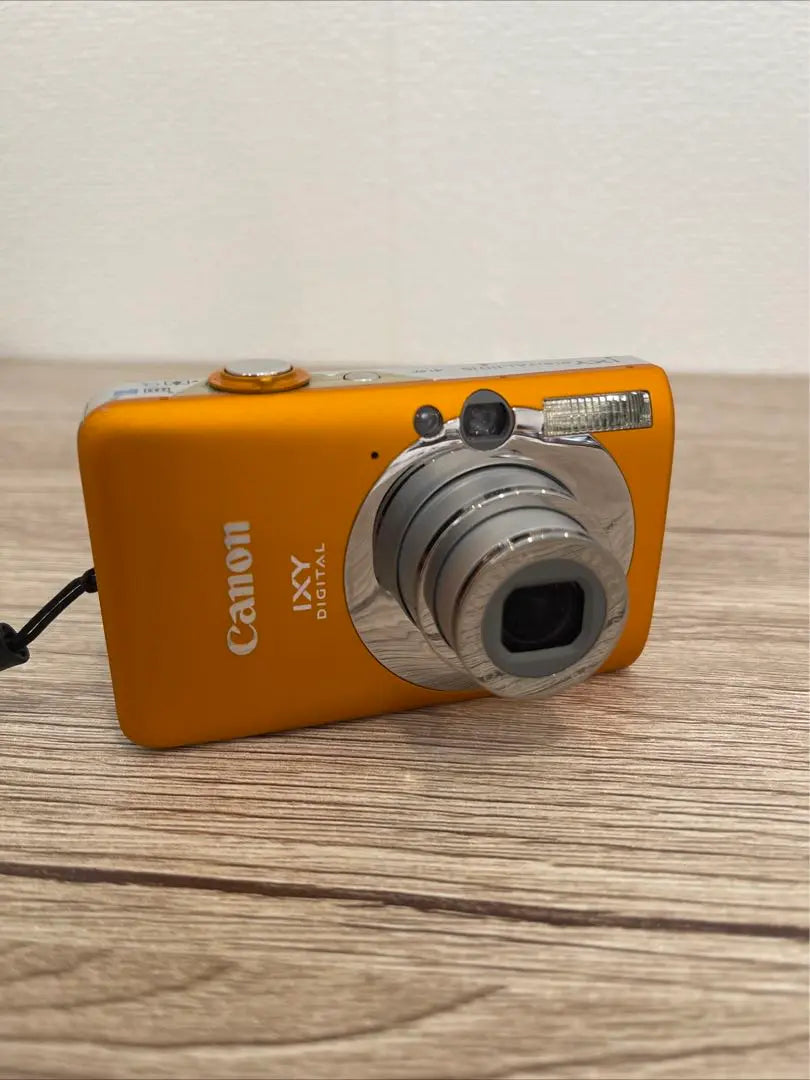 1664.Canon IXY Digital Camera 110IS Orange