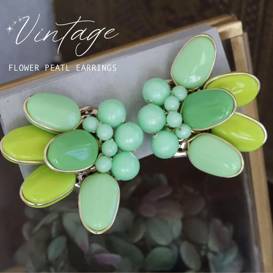 Vintage earrings, green petals, pastel color, large