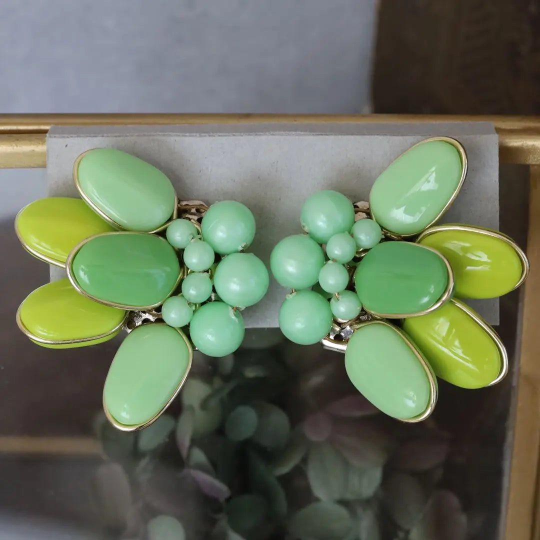 Vintage earrings, green petals, pastel color, large