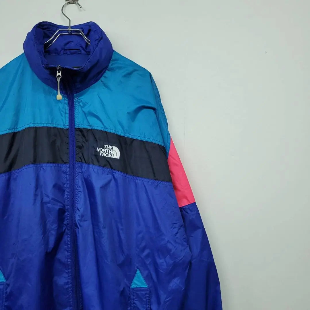 [Ropa usada] Chaqueta de nailon bordada The North Face en azul y multicolor