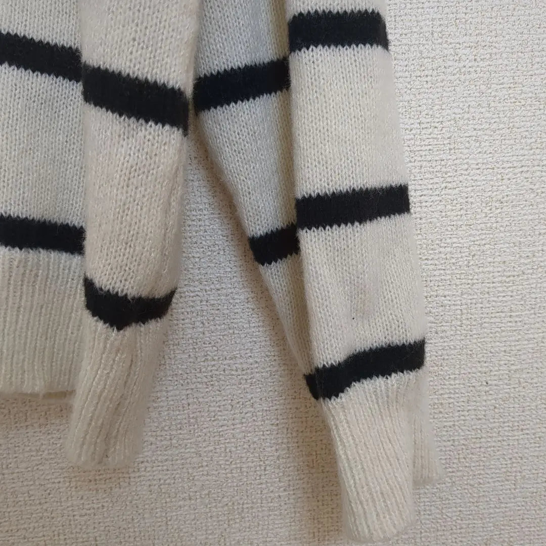 Ivory and black striped V-neck knit