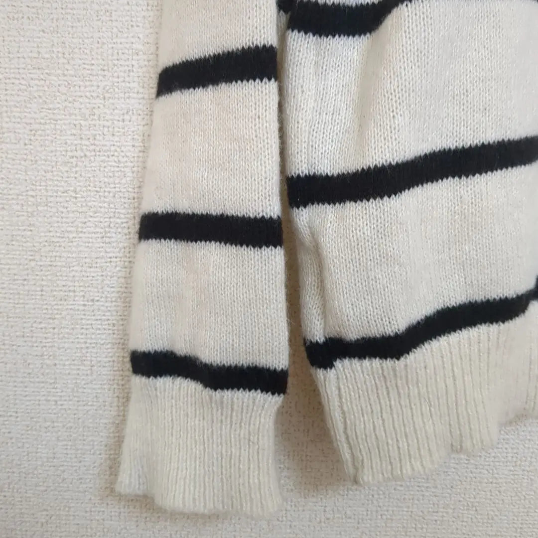 Ivory and black striped V-neck knit