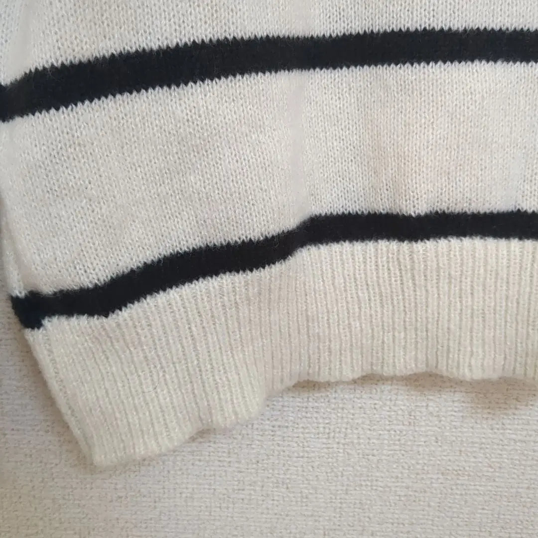 Ivory and black striped V-neck knit