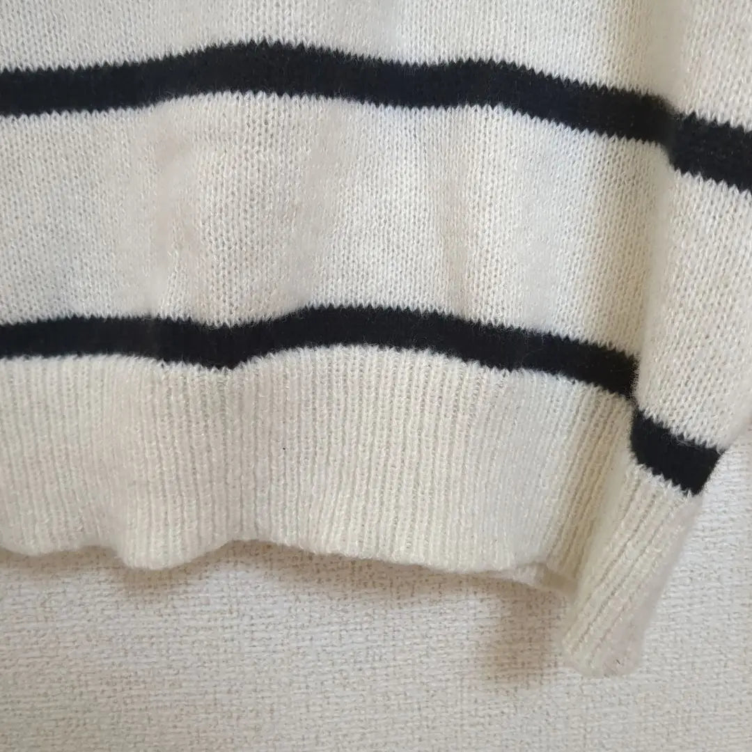 Ivory and black striped V-neck knit