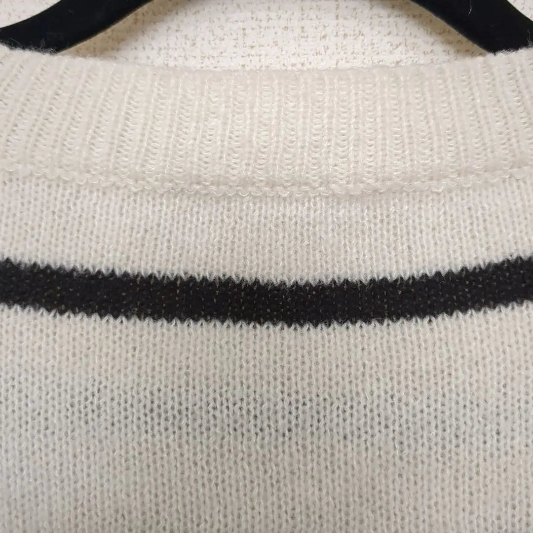 Ivory and black striped V-neck knit