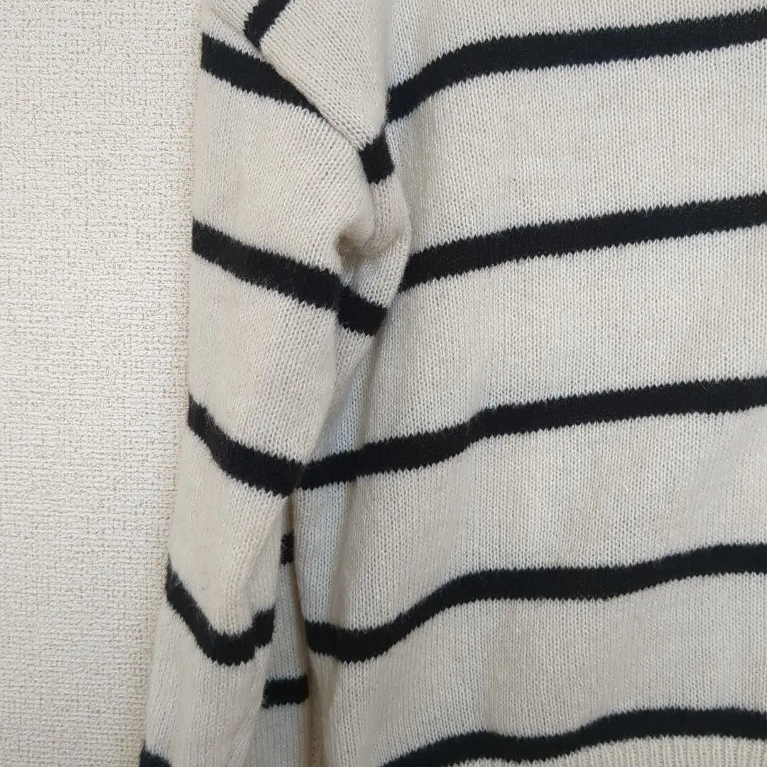 Ivory and black striped V-neck knit