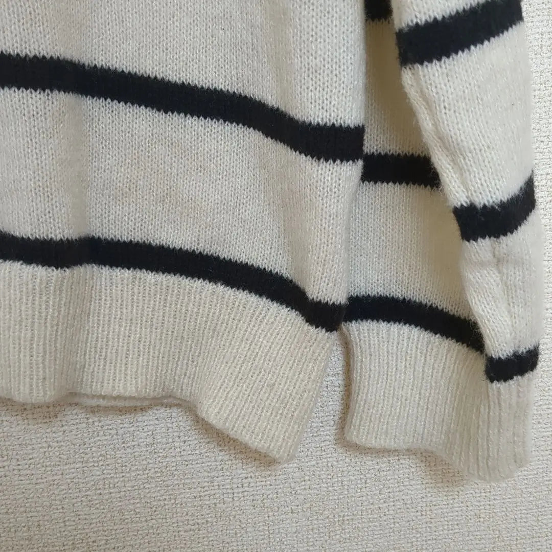 Ivory and black striped V-neck knit