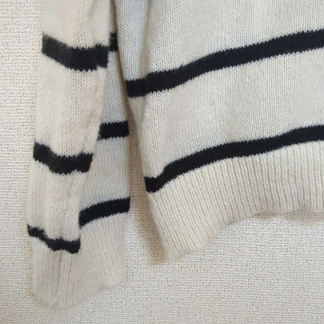 Ivory and black striped V-neck knit